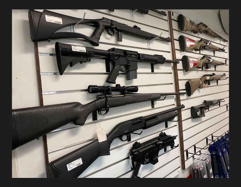 Guns on racks in store